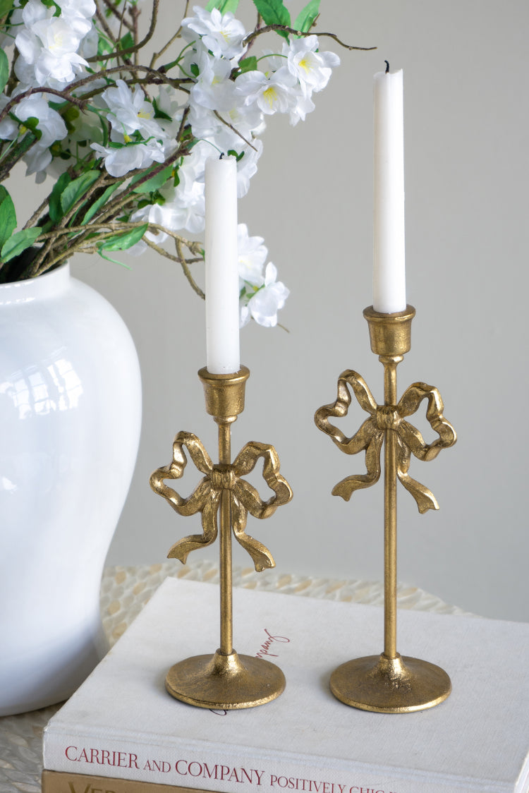 S 2 Gold Cast Iron Candle Holders With Playful Bow Design