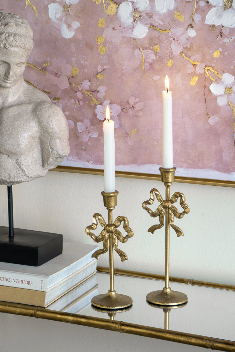 S 2 Gold Cast Iron Candle Holders With Playful Bow Design