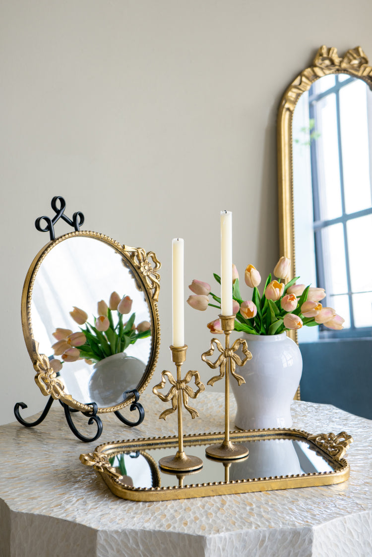 S 2 Gold Cast Iron Candle Holders With Playful Bow Design