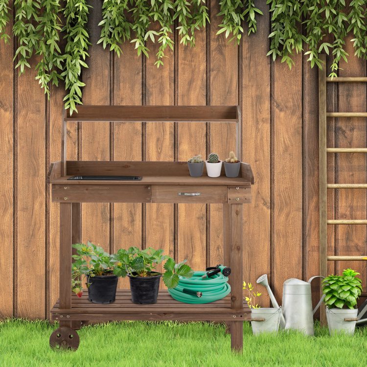 Outsunny 36'' Wooden Potting Bench Work Table With 2 Removable Wheels, Sink, Drawer & Large Storage Spaces, Brown